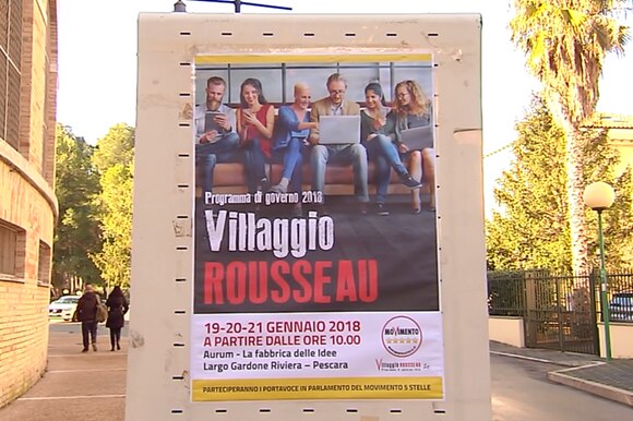 La locandina del Villaggio Rousseau (raduno di attivisti e candidati 5 Stelle) fuori dal centro Aurum di Pescara