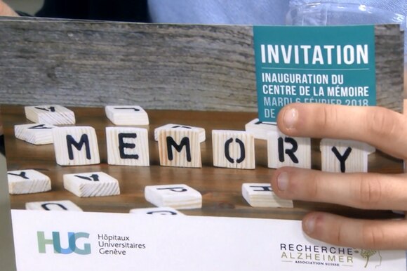 Il volantino dell invito all inaugurazione del Centro della memoria, con tessere di Scrabble che compongono la scritta Memory
