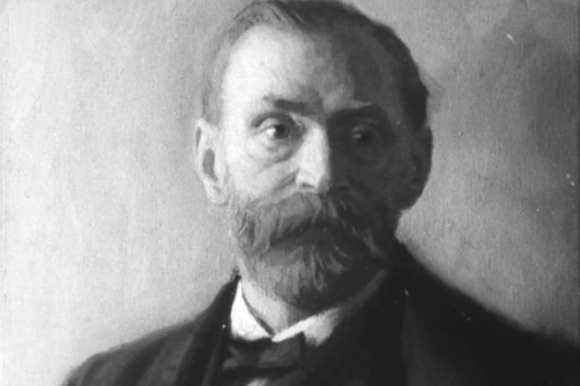 Ritratto dipinto a mezzobusto di un uomo con la barba e in abito formale; si intuisce ottocentesco