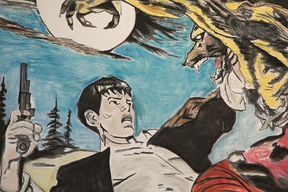 Un particolare del murale con protagonista Dylan Dog aggredito da un lupo mannaro.